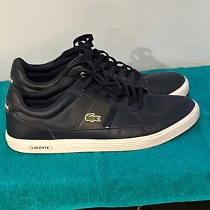 Lacoste size 9 sneakers.  Very lightly used in a smoke free home!